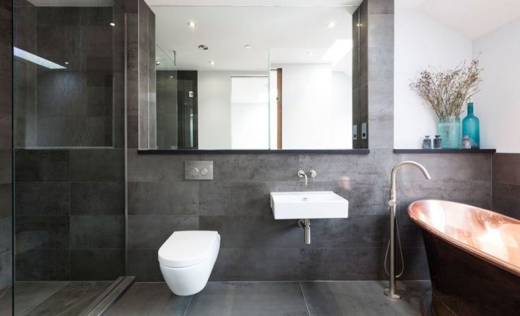 contemporary-grey-tiles-and-copper-bathtub